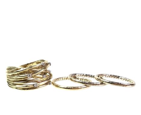 DIAMOND DRESS RING, ALONG WITH THREE GOLD BANDS the diamond ring set with seven diamond chips and marked for nine carat gold,