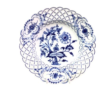 TWO MEISSEN BLUE AND WHITE PLATES, AND OTHER ITEMS decorated with flowers and foliage and pierced border, each bearing cross 