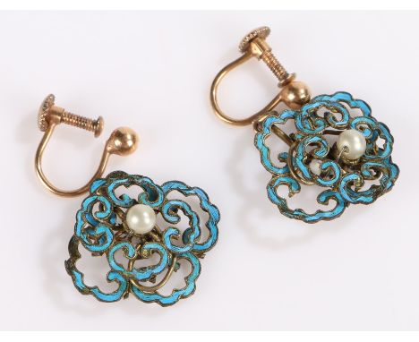Pair of enamel earrings, the pearl set centres surrounded by pierced turquoise enamel scroll decoration