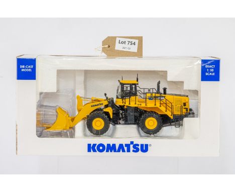 Manufacturer  - Universal Hobbies | Description - Komatsu KOM345 WA600-8 Stone Handler | Stock Code - UH8153 | Notes - Mint c