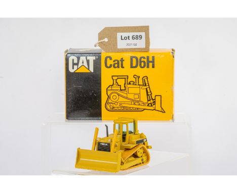 Manufacturer  - Conrad | Description - CAT D6H Track Type Tractor | Stock Code - 2851 | Notes - | Scale - 1:50 | Certificate 