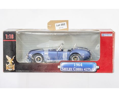 Manufacturer  - Yatming | Description - Shelby Cobra 427S/C 1964 | Stock Code - 92058 | Notes - | Scale - 1:18 | Certificate 