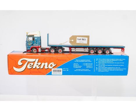 Manufacturer  -  | Description - MAN TGX XXL with flatbed trailer | Stock Code - 61406 | Notes - | Scale - 1:50 | Certificate