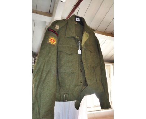 WW2 Royal Marine officer's battledress jacket with shoulder badges over a yellow star and "G"