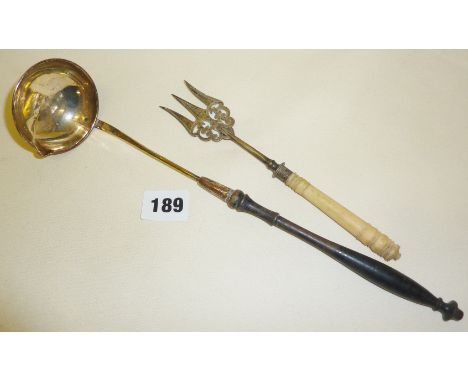 Georgian plated toddy ladle and an ornate antique bread fork