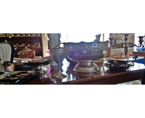Large silver-plated punch bowl with ladle and other silver-plated items