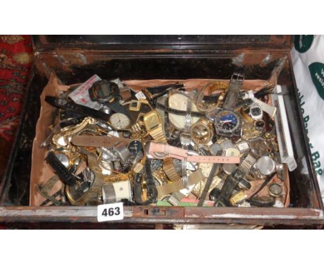 Large tin cash box full of vintage wrist watches including Sekonda, Casio etc