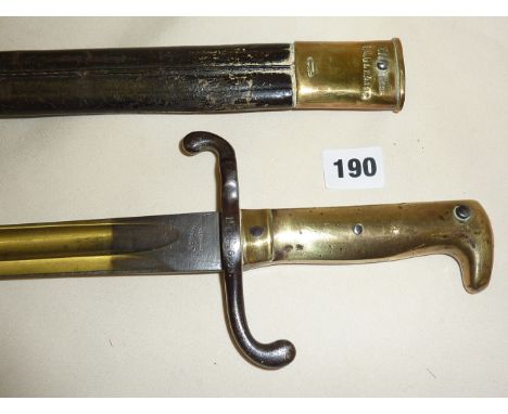 Imperial German Seitengewehr 1871 pattern bayonet with brass grips and leather scabbard (named)