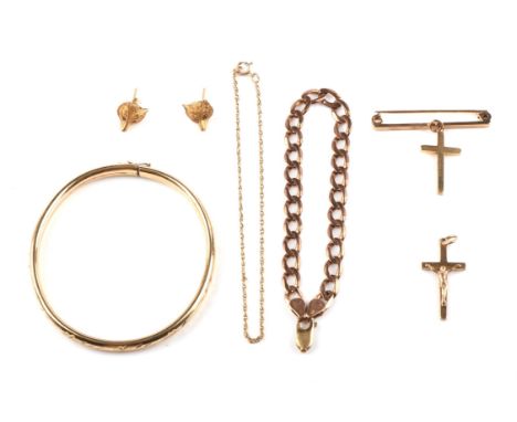 A pair of Fox head earrings set with round cut ruby eyes,  a floral engraved yellow gold bangle, a chain bracelet, bar brooch