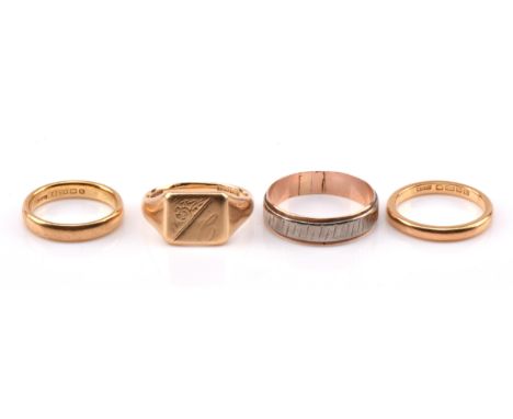 Four gold rings, including a 9 ct bi-coloured band, ring size V 1/2, a square signet ring, in 18 ct, size T and two 22 ct wed