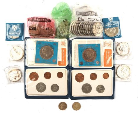 A mixed collection of British and foreign coins mostly as taken from circulation, including a US Morgan dollar 1889 in a pend