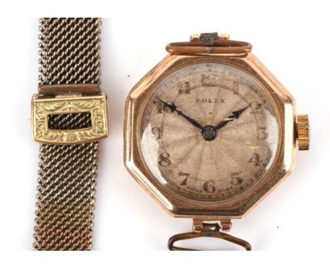 Rolex A ladies Gold wristwatch the hexagonal bezel  surmounting a signed silver wave dial, Arabic numeral hour markers within