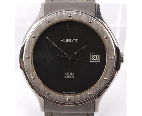 Hublot a Gentleman's fusion titanium wristwatch, the bezel set with 12 screws marking hours, surmounting a black signed dial 