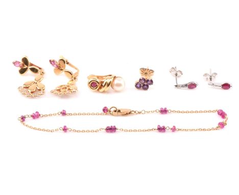 A pair of red and white paste drop earrings, a pair of ruby and diamond earrings, a ruby bead bracelet and a single ruby and 