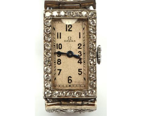 Art deco Omega diamond set cocktail wristwatch, rectangular dial with Arabic numerals powered by a manual wind movement with 