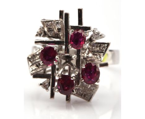 Vintage ruby and diamond cluster ring, set with oval cut rubies and round brilliant cut diamonds, mounted stamped 18ct, ring 