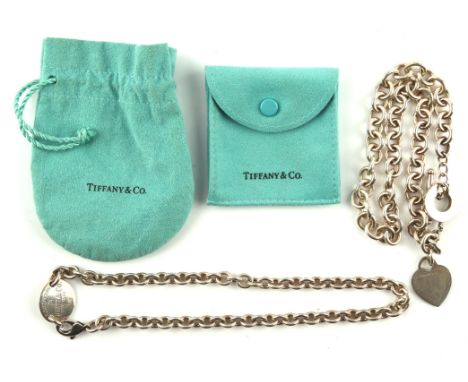 Two Tiffany & Co. necklaces, a heart tag toggle necklace, length 39cm, stamped "Tiffany & Co. 925", and an oval tag necklace,