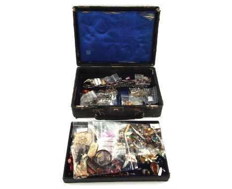 Large selection of costume jewellery, mostly base metal but with some silver, including a bag of silver and base metal findin
