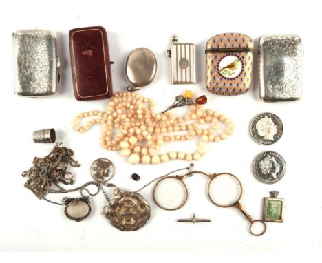 A group of silver items, including a Victorian locket, two silver cigarette cases, silver necklaces, gold plate lorgnette, si