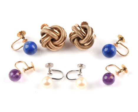 Four pairs of earrings, all with screw back fittings for non-pierced ears, including a pair of amethyst bead earrings, a pair