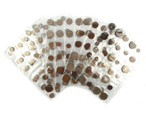 A collection of mixed British and foreign circulated and uncirculated coins, including a cartwheel penny 1797, a very worn Vi