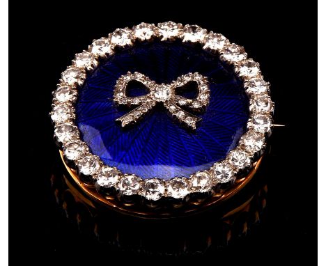 Antique old cut diamond brooch, central Guilloche blue enamel panel, with a diamond set bow motif, set within an old cut diam