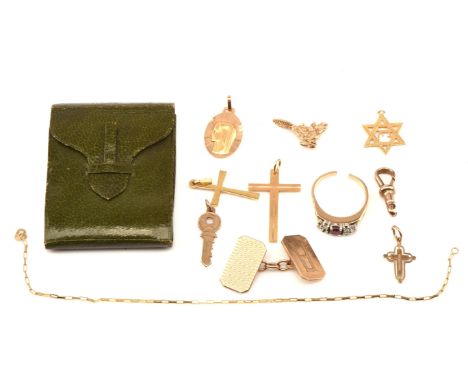 A group of gold items, including a 14 ct Beaver charm, 18 ct gold cross pendant, a ruby and diamond ring, 3 gem set stick pin