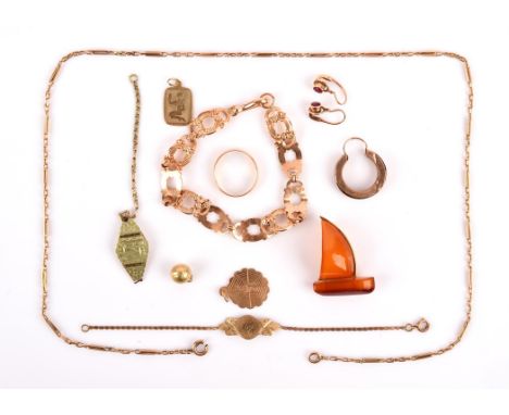A group of gold items, an amber sailing boat brooch on 18 ct,  a pair of round old cut ruby earrings in a bezel settings, a f