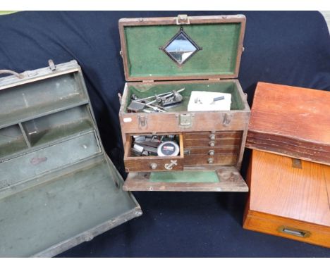 AN ENGINEER'S TOOL CHEST, WITH A FEW TOOLS another tool box (both with woodworm), an empty Harrods canteen box, and another