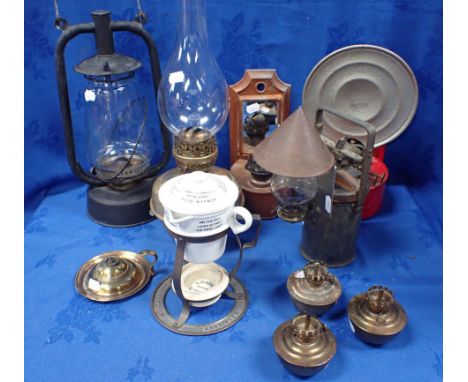 A 'CRESTELLA' CARBIDE LAMP, A CLARKE'S 'PYRAMID' WARMER and some oil lamps