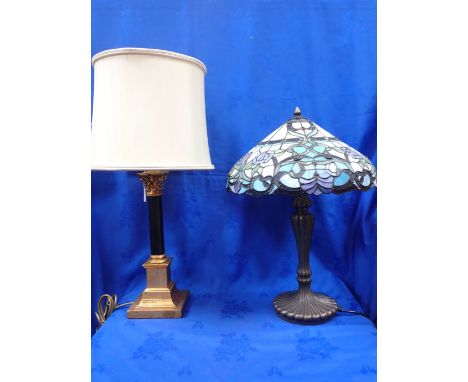 A TIFFANY STYLE TABLE LAMP, WITH LEADED GLASS SHADE and a Corinthian column table lamp with silk shade