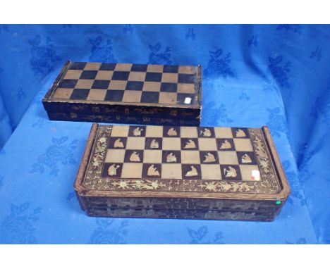A CHINESE LACQUERED GAMES BOX another similar (some damage), and a 19th century mahogany cribbage board