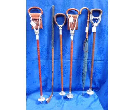 A COLLECTION OF VINTAGE SHOOTING STICKS and other items