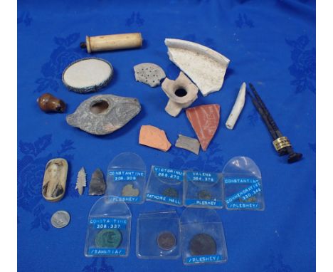 A COLLECTION OF SMALL ARTIFACTS including ancient coins, roman nails, ceramic pieces, a scrimshaw carving and other similar 