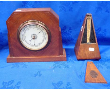 A MAELZEL MAHOGANY METRONOME together with a mahogany cased desk barometer