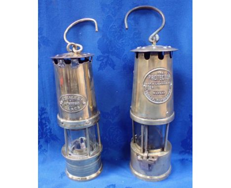 A BRASS MINER'S LAMP 'THE PROTECTOR' Eccles, Manchester, and another 'W. R. Teale &amp; Co, Swinton (2)