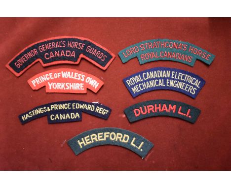 British Cloth Shoulder Titles (7) including: Durham Light Infantry, Hereford Light Infantry, Prince of Wales's Own Yorkshire 