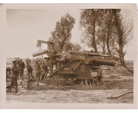 British WWI RP&nbsp;Press Publication Photograph showing a B. L. 15inch Siege Howitzer Mk. 1 being loaded. Some excellent det