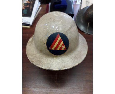 American Civil Defence Air Raid Warden Helmet, c. 1942-1945. This metal helmet is round in shape and is painted in a cream co