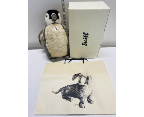 A large Steiff penguin with box and certs etc 40cm tall. 