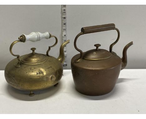 A vintage brass and copper kettle 