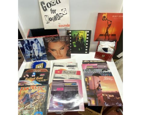 A selection of mixed genre LP &amp; single records in vintage carry cases. 