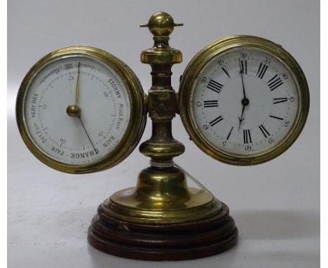 A Victorian brass double drum cased desk top combination clock / barometer with thermometer on reverse, on marble base, heigh