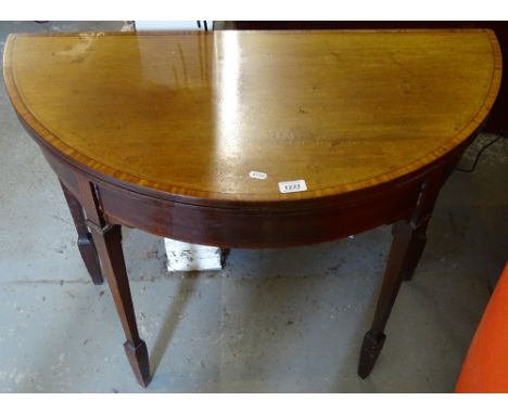 A 19th century cross-banded mahogany D-end fold over card table, raised on square tapered legs, spade feet, width 91cm