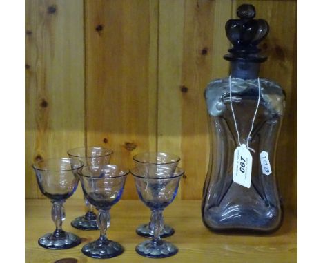 A Continental amethyst glass liqueur set
