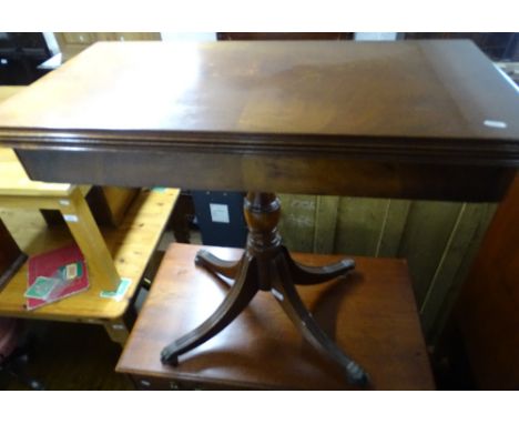 A reproduction rectangular mahogany fold over card table, width 80cm