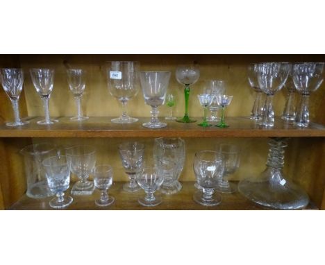 2 shelves of wine goblets, decanter etc