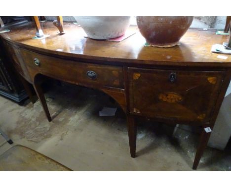A Georgian mahogany bow-front sideboard, raised on square tapered legs, length 176cm