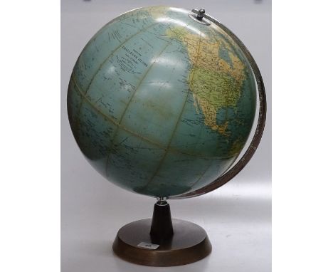 A Vintage Philips 13.5"" Challenge Globe on wooden stand