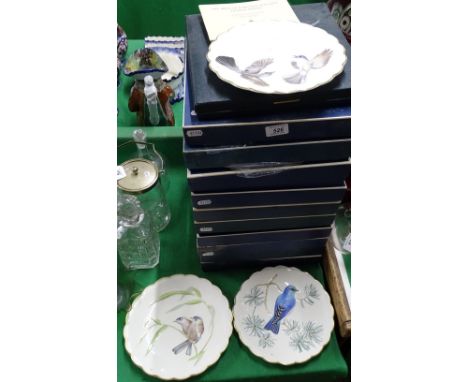 Boxed set of Royal Worcester bird design plates